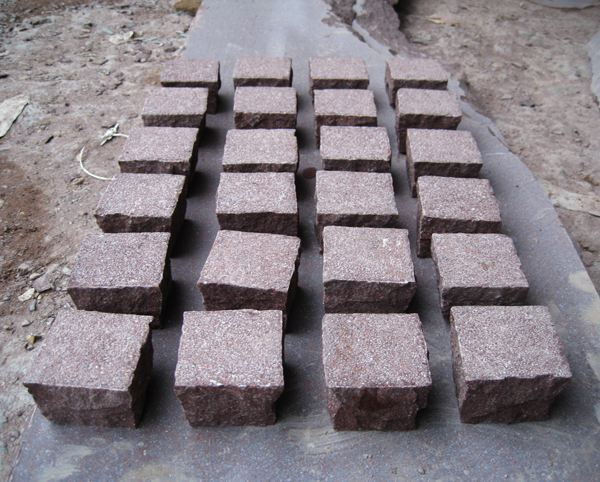 Red porphyry flamed cobbles.jpg
