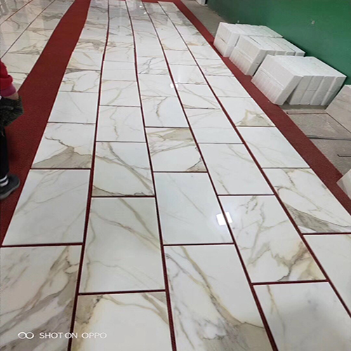 Calacatta gold tiles 2.jpg